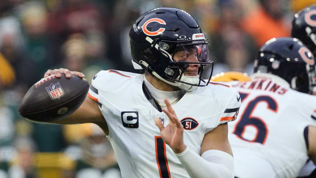 Bears quarterback Justin Fields
                                                                                 passes the ball